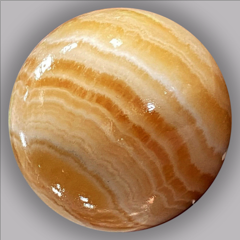 CALCITE jaune, sphre 303 g.,  59 mm.